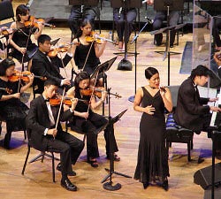 Vocalist MelSoulTree performs in Jazz Meets Symphony Orchestra concert